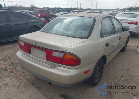 1997 Mazda Protege Dx/Lx z USA, uszkodzony, nr VIN JM1BC1413V0151138